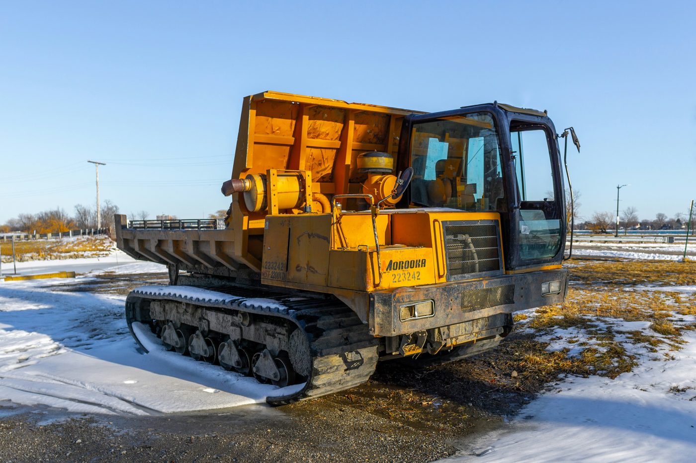 Aurora rubber-track carrier dump truck
