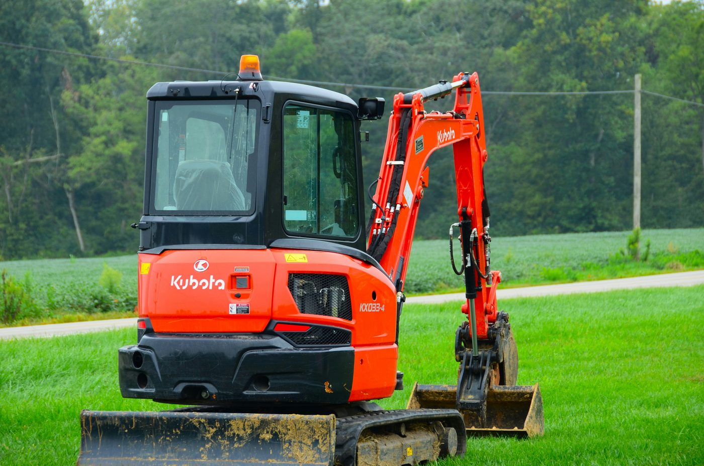 Kubota KX033 mini excavator on rubber tracks